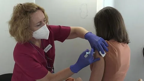 EU hits target of delivering enough Covid jabs to cover 70% of adults, Madrid, E Stock-Footage 204047225