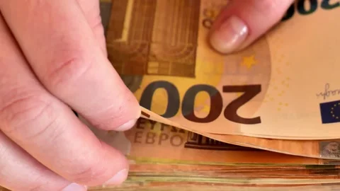 EU Money.Close-up of hands counting banknotes. Stock Footage 293340360