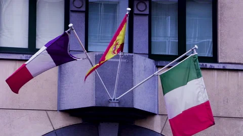 EU states flags blowing in the wind outside the EU parliament Stock Footage 142731555