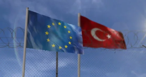 EU Turkey waving flags with barbed wire border Stock Footage 315117008