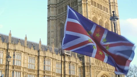 EU Union Jack flag outside Parliament, Westminster, London Stock Footage