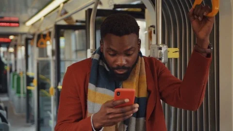 Euphoric black business guy learning mobile news celebrating business triumph Stock Footage 121475621