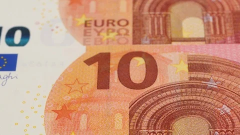 Euro 10 banknotes close up tracking. Slider shot. 4K Stock Footage 125525080