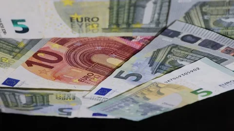Euro bank notes rotating up side down video from a unique perspective Stock Footage 271688219