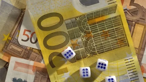 Euro Banknotes and dice Vídeo Stock 70566636