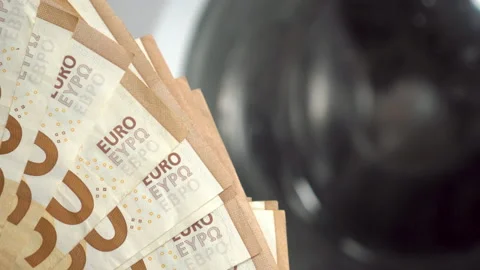 Euro banknotes and a functioning washing machine in blur Video stock 157446177