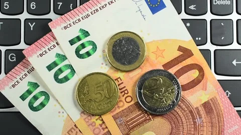 Euro banknotes on Computer Keyboard Top View Stock Footage 340389523