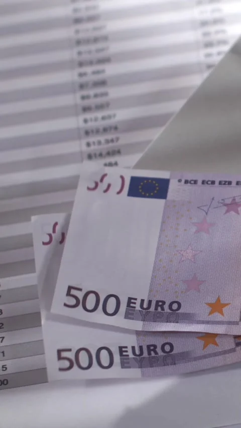 Euro Banknotes Falling in Slow Motion on Financial Documents Stock Footage 338142424