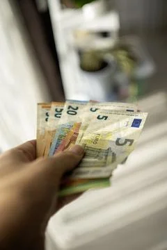 Euro banknotes in the hand Stock Photos