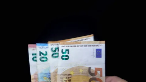 Euro banknotes in hands in 4k Stock Footage 150726223