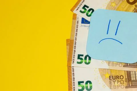 Euro banknotes with notes on yellow background isolated. Covid, Coronavirus.C Stock Photos