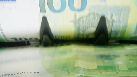 Euro banknotes processed by a money counting machine for financial audit Stock Footage 340024017
