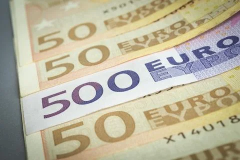 Euro banknotes in a row stacked by value; European Union Currency. Selectiv.. Stock Photos