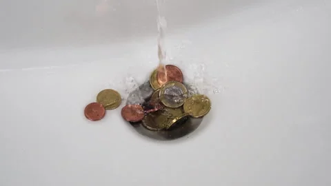 Coins Sink Stock Video Footage | Royalty Free Coins Sink Videos | Pond5