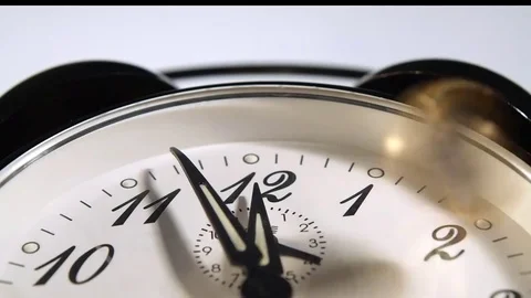 Euro coin spinning on a clock Stock Footage 70090680