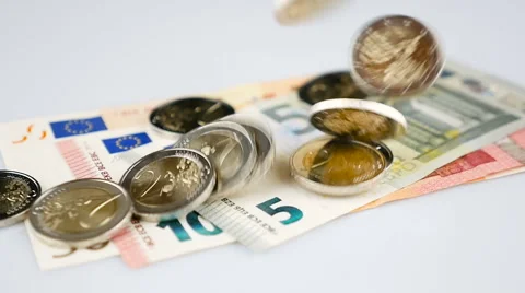 Euro coins falling down on banknotes Stock Footage 60027747