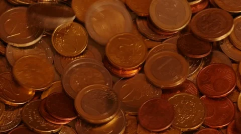 Euro coins falling to surface extended version Stock Footage 46178430