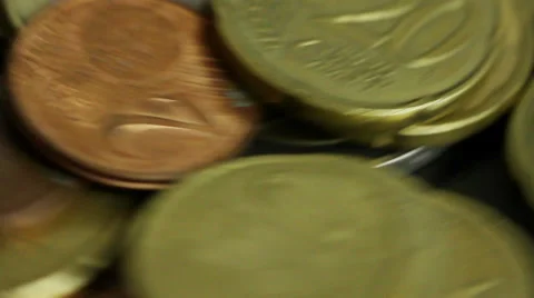 Euro coins spinning, close up macro shot Stock Footage 34606331