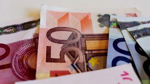 Euro Dollar Notes scattered on white background Stock Footage 72232028