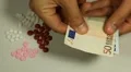 Euro EUR, Counting Drugs and Money, Health Care, Colorful Pills HD Footage