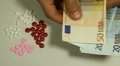 Euro EUR, Counting Drugs and Money, Health Care, Colorful Pills HD Footage