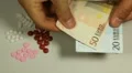 Euro EUR, Counting Drugs and Money, Health Care, Colorful Pills HD Footage
