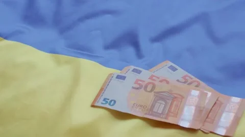 Euro falling on ukraine flag Stock Footage 290510998
