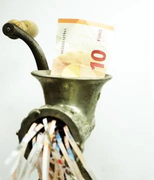 Euro note in a meat grinder Stock Photos