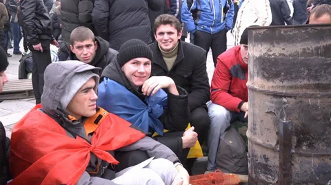 #EuroMaydan Men get warm by the Fire in the Barrel Kyiv revolution 2013 - 2014 Stock Footage 33713713