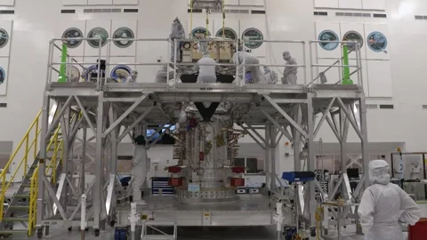 Europa Clipper's avionics module is stacked on top of the spacecrafts main body Stock Footage 289534383