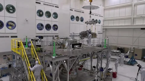Europa Clipper's avionics module is stacked on top of the main body Stock Footage 289534401
