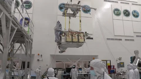 Europa Clipper's avionics module is stacked on top of the main body Stock Footage 289534408