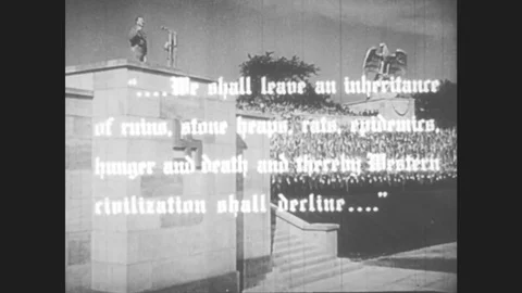 Europe 1940s: man on roof. Dead bodies on ground. Faces of dead people. Title Stock Footage