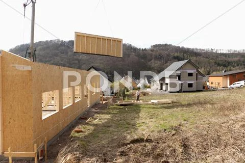 Europe, Germany, Rhineland Palantinate, Man installing and fixing wooden walls Stock Photos