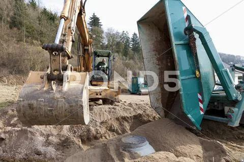 Europe, Germany, Rhineland Palatinate, Installing cistern of rainwater Stock Photos