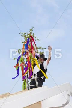 Europe, Germany, Rhineland Palatinate, Man celebrating topping out ceremony Stock Photos
