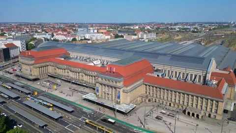 Europe largest terminus central station in Leipzig showing trams and buses Stock Footage 284295843