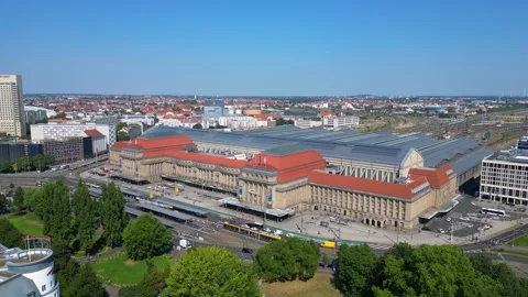 Europe largest terminus central station in Leipzig showing trams and buses Video stock 284296371