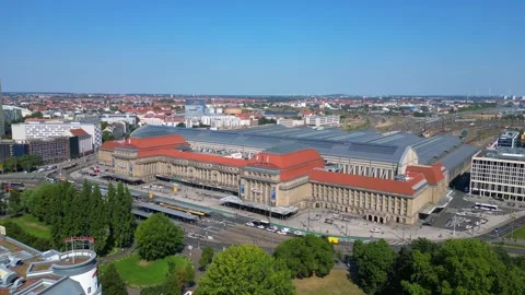 Europe largest terminus central station in Leipzig showing trams and buses Stock Footage 284308957