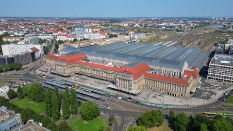 Europe largest terminus central station in Leipzig showing trams and buses Stock Footage 284309281