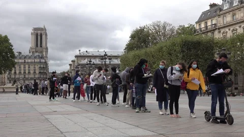 Europe second wave coronavirus, long queue Covid test center Paris France Stock Footage 139614847