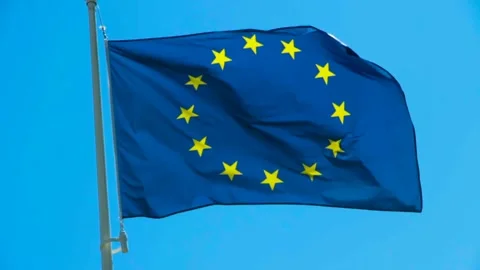 European flag in the sun at daylight in blue sky Stock Footage 238852653
