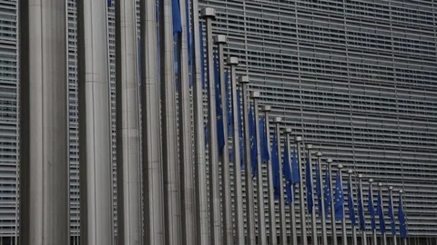 European flags waving in the wind, outside the European Council in Brussels Stock Footage 70515381
