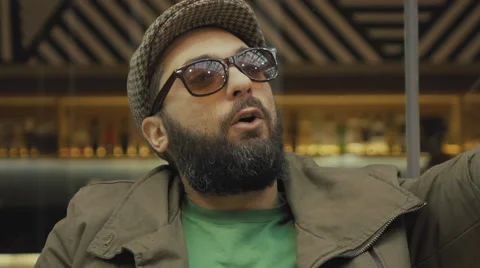 European man in cafe causing a scene complaining yelling,slow motion Stock Footage 61156465