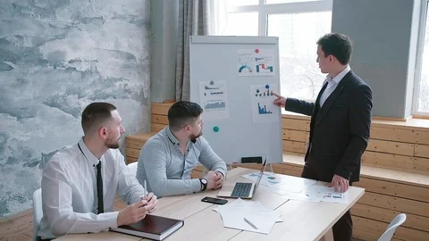 European man presents a new development strategy for the company. Stock Footage 125635344