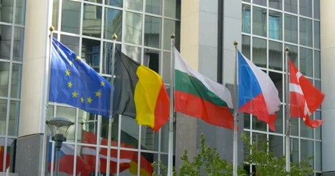 European Parliament Brussels EU Belgium building Union Europe flags politics law Stock Footage