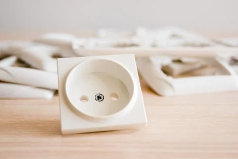 European power socket and the stack of socket frames Stock Photos