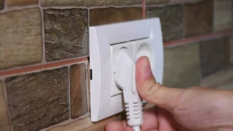 European power socket model plugging and unplugging the appliance from it. 動画素材 140987547