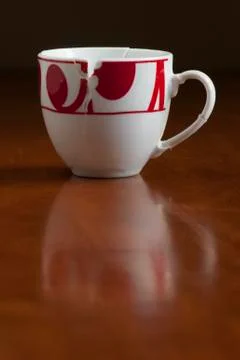 European style broken coffee cup put together Stock Photos