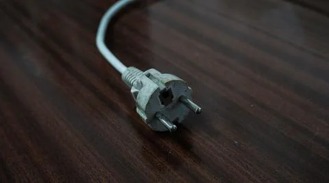 European style plug on the table Stock Photos